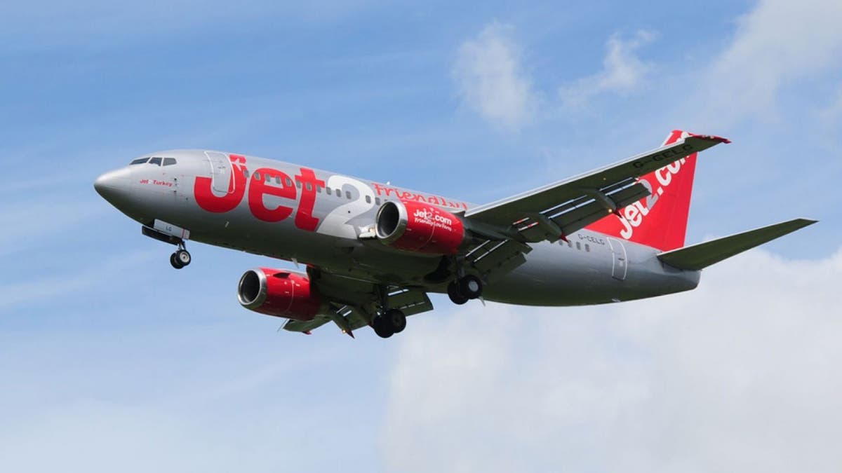A woman will spend two years in jail after threatening to “kill” everyone on board a Jet2 flight last summer and attempting to open the emergency exit.