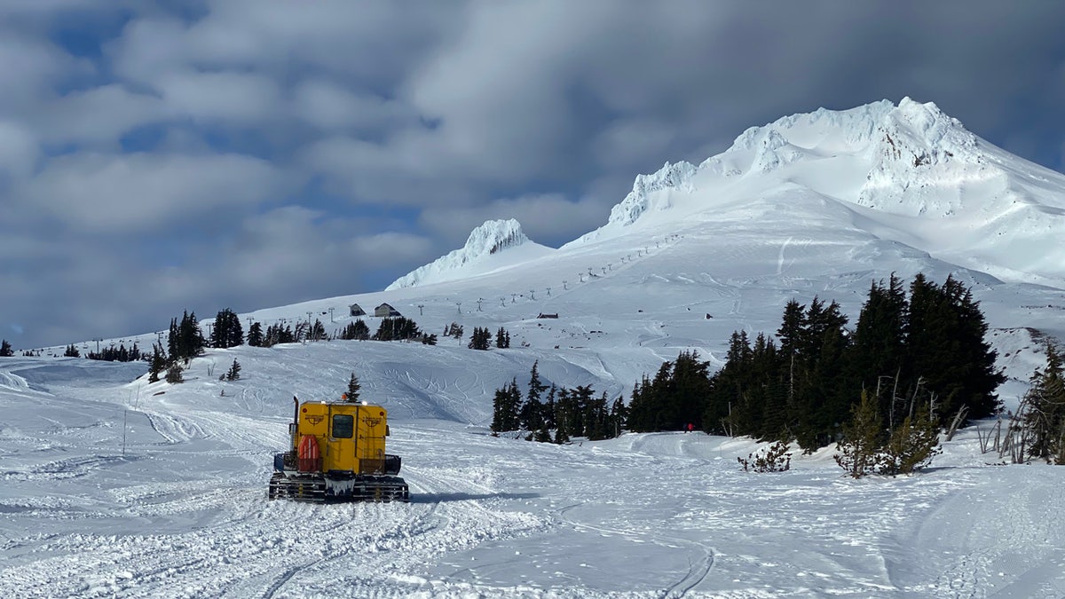 A snowcat carries search and rescue crews up Mount Hood on Feb. 25.