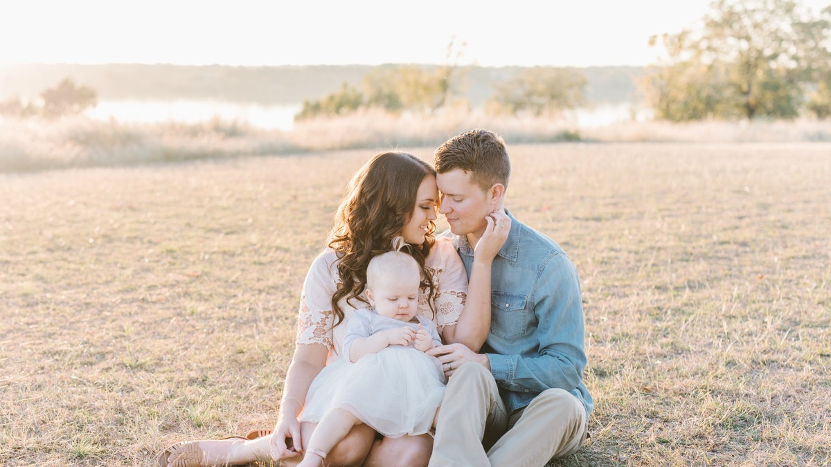 Callie and Kevin Colwick with baby Kenzi before Callie lost her feet.