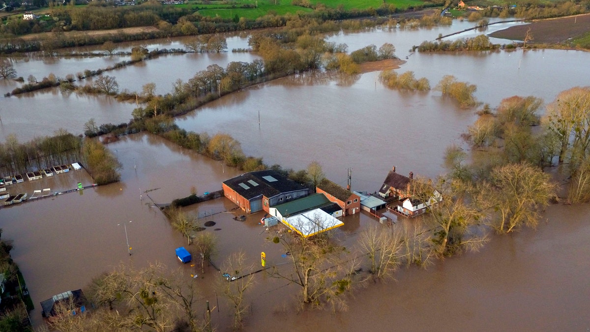 Flood water surrounds Upton upon Severn, England, Tuesday Feb. 18, 2020.