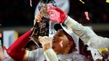 Kansas City Chiefs' Patrick Mahomes hoists the trophy after defeating the San Francisco 49ers in the NFL Super Bowl 54 football game Sunday, Feb. 2, 2020, in Miami Gardens, Fla. (AP Photo/David J. Phillip)