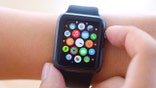 İstanbul, Turkey - July 16 2015: Hand touching an Apple Watch displaying home screen. Apple Watch is a smart watch, devices developed by Apple Inc.