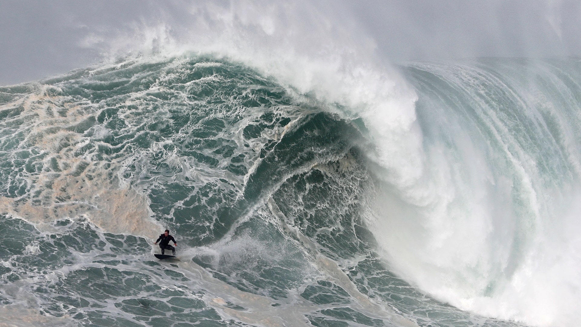 Sebastian Steudtner from Germany rides a wave during a surfing session at Praia do Norte or North Beach in Nazare, Portugal, Feb. 15, 2020.