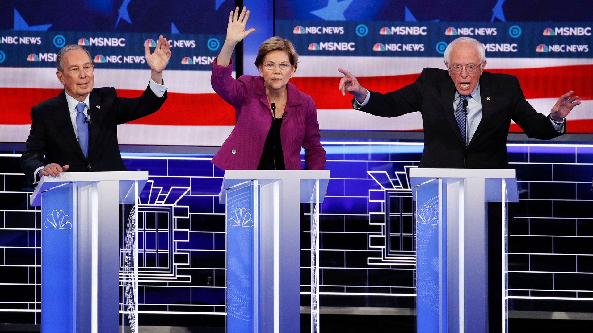 Democratic presidential candidates, Mike Bloomberg, Sen. Elizabeth Warren, and Sen. Bernie Sanders participate in a Democratic presidential primary debate in Las Vegas, Feb. 19, 2020.