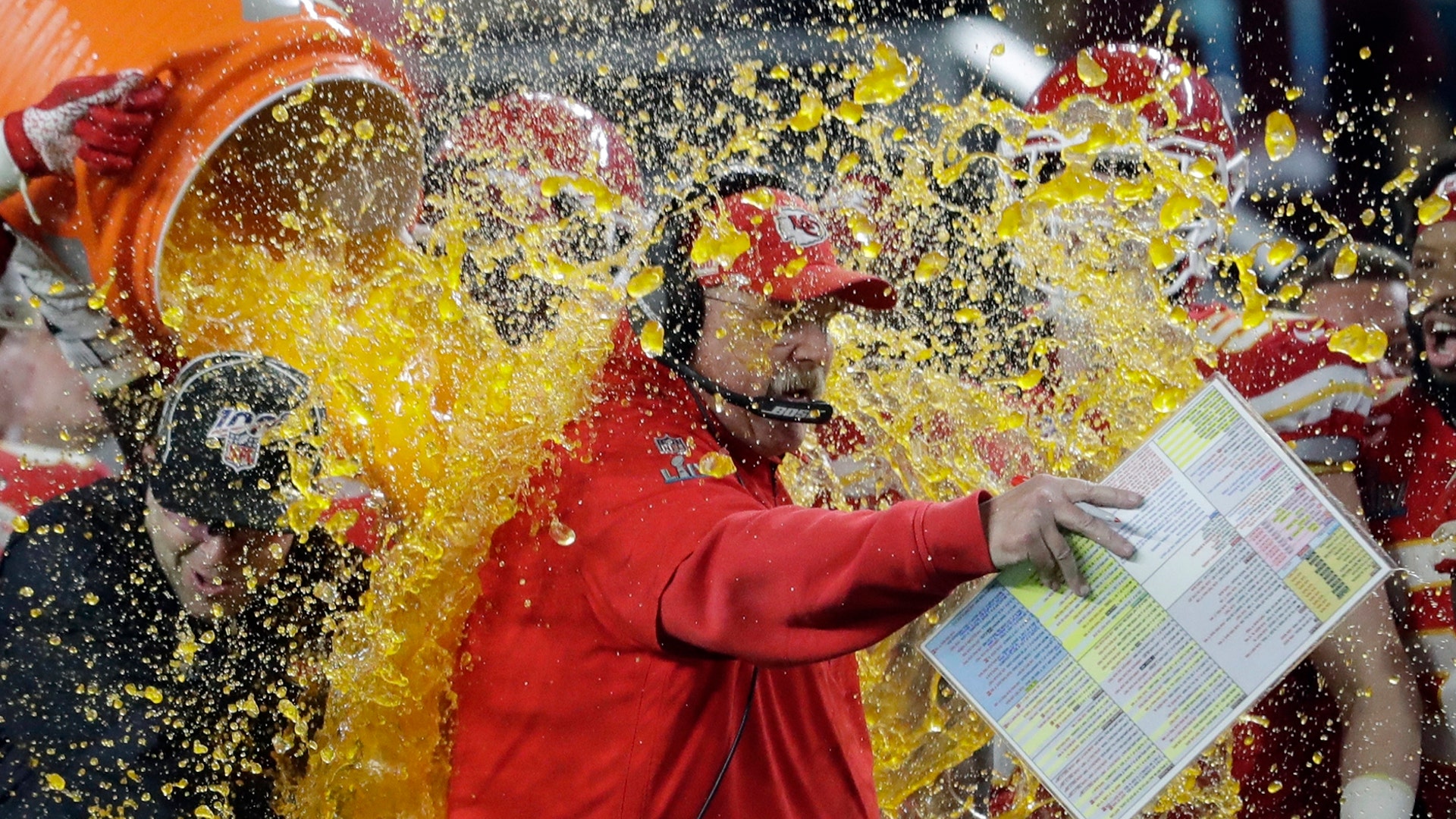 Kansas City Chiefs head coach Andy Reid is doused on the sideline on way to winning the Super Bowl in Miami, Feb. 2, 2020.