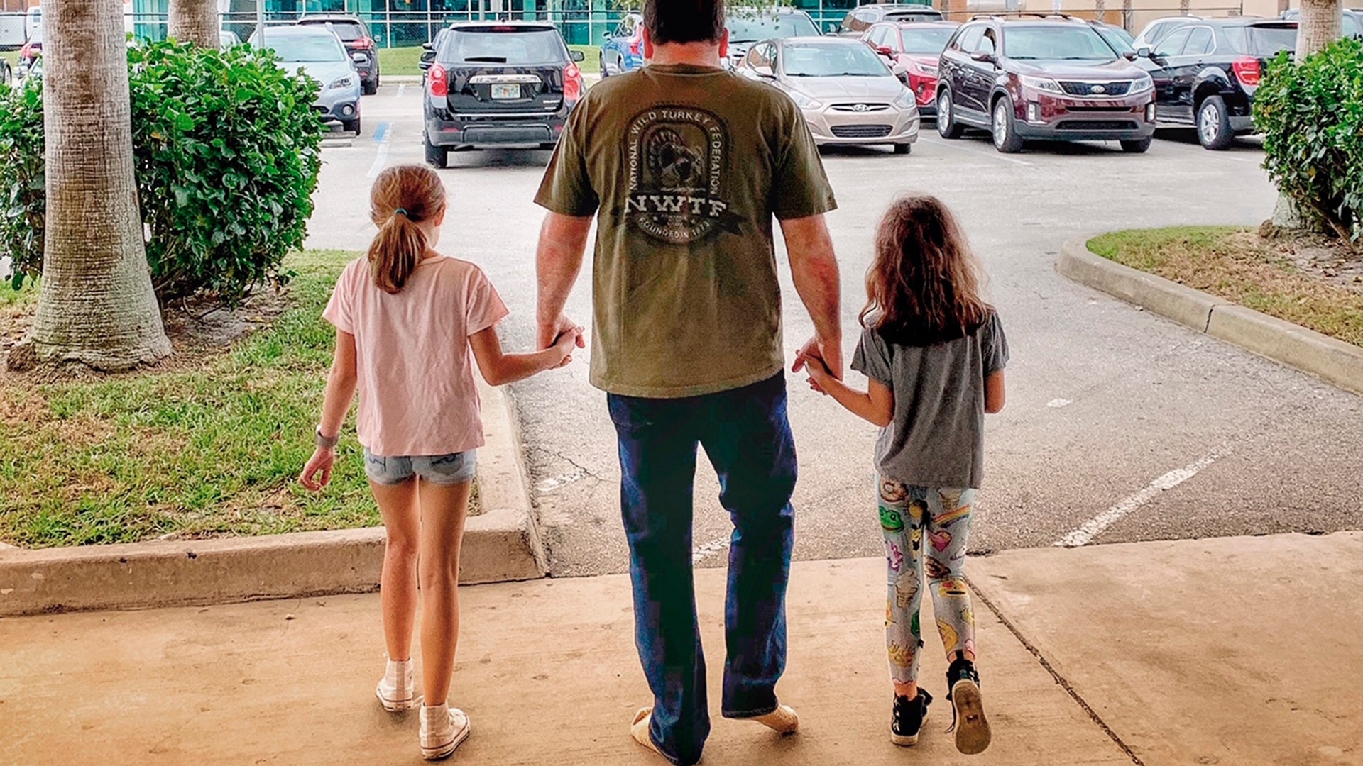 NASCAR driver Ryan Newman and his daughters, Brooklyn Sage and Ashlyn Olivia leave the Halifax Medical Center 42 hours after his frightening crash on the final lap of the Daytona 500, in Daytona Beach, Florida, Feb. 19, 2020.