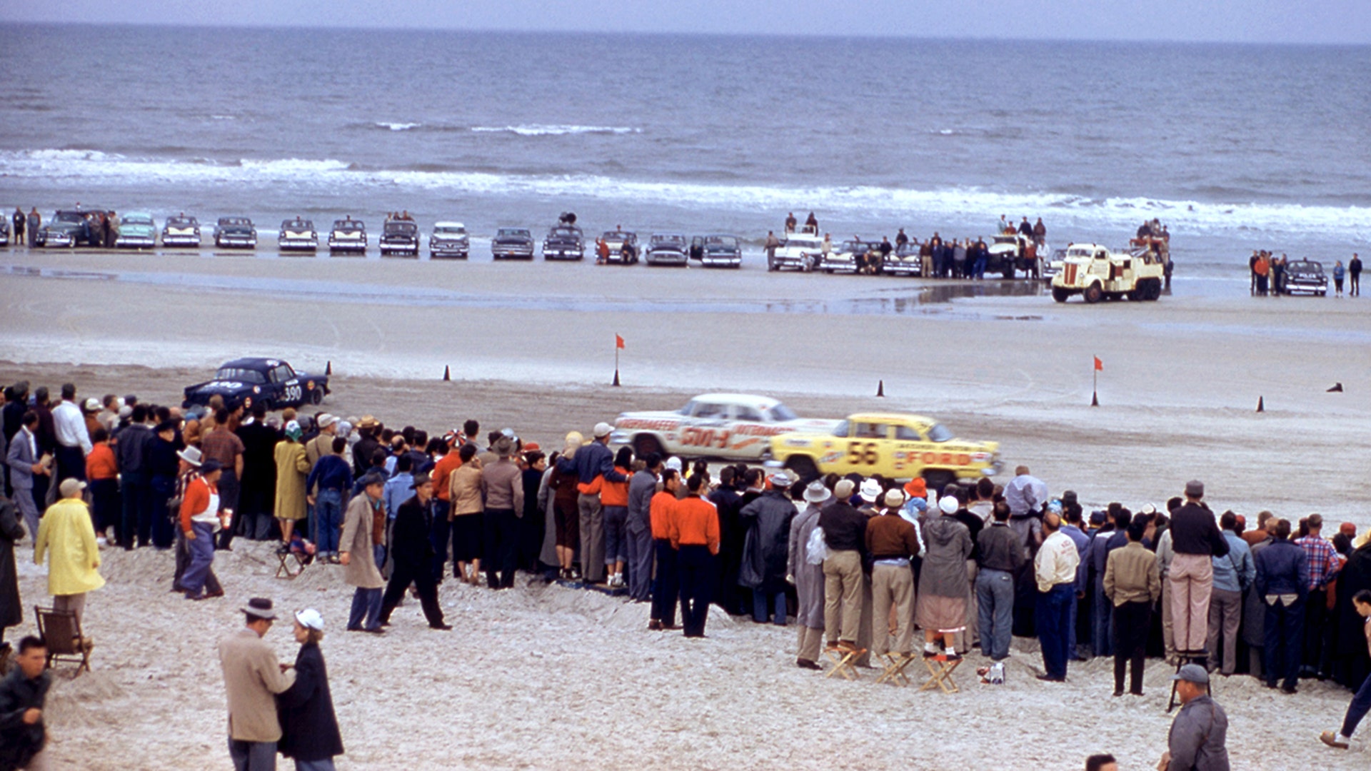 Ray Thompson in the #390 Studebaker spins out as Fonty Flock in the #500B Dodge and Joe Eubanks in the #56 Ford get ready to race past him during the NASCAR Daytona Beach and Road Course race on Feb. 26, 1956.