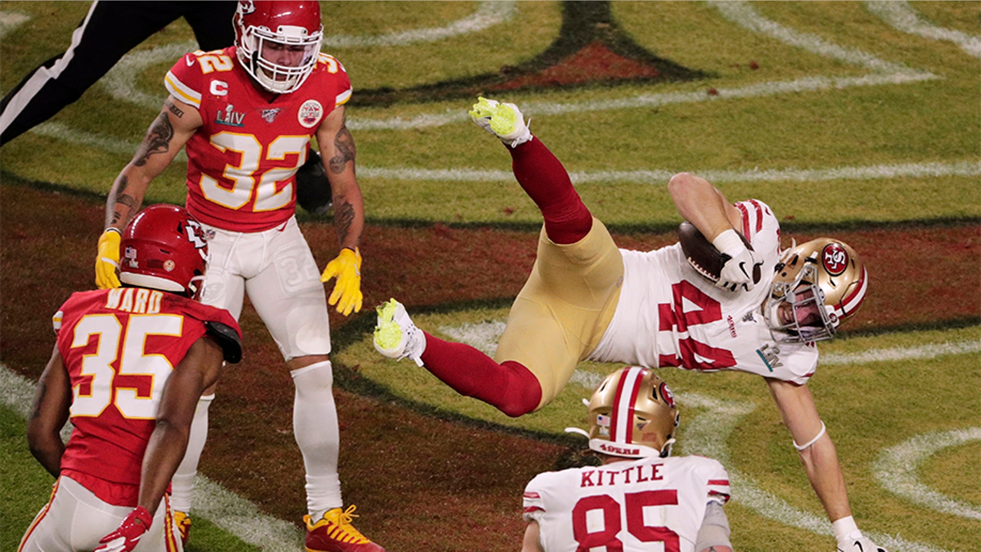 San Francisco 49ers' Kyle Juszczyk (44) scores a touchdown, during the first half of the game.