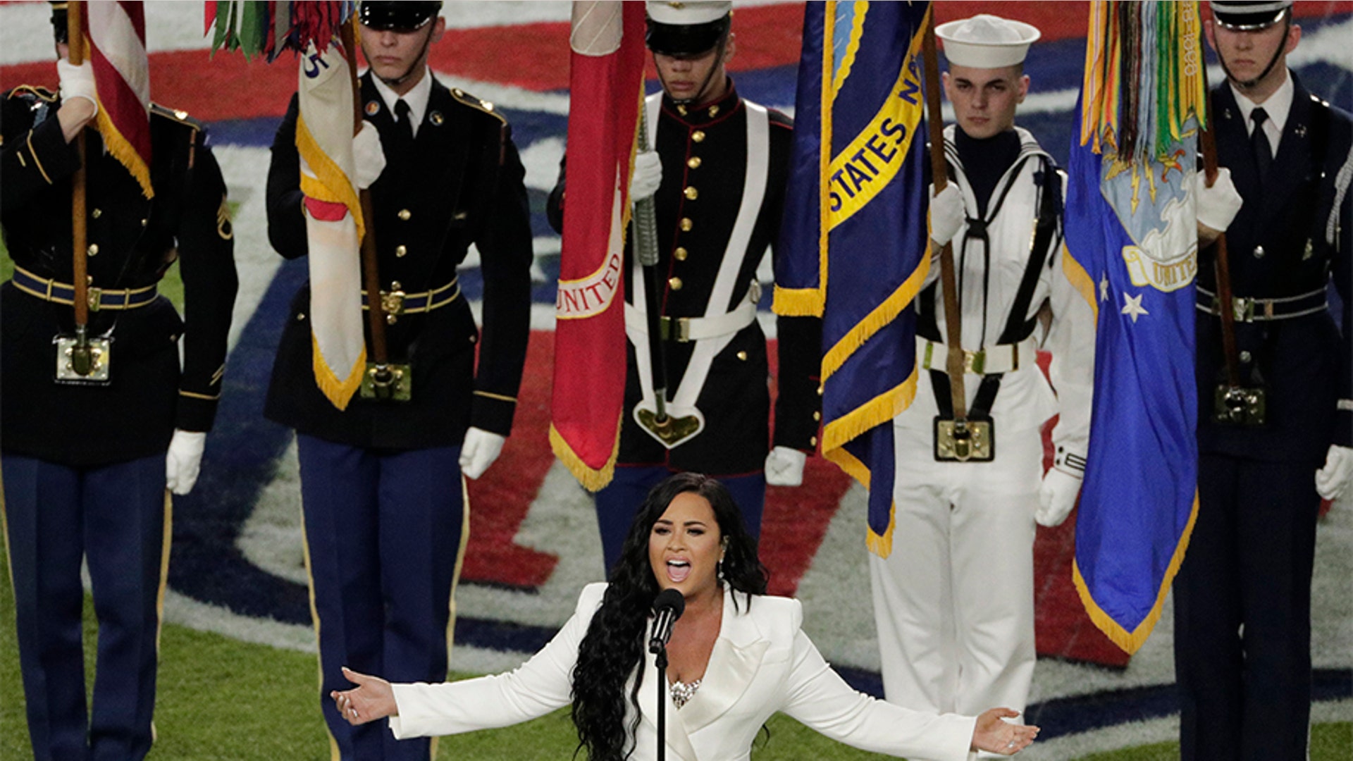 Singer Demi Lovato sings the national anthem.