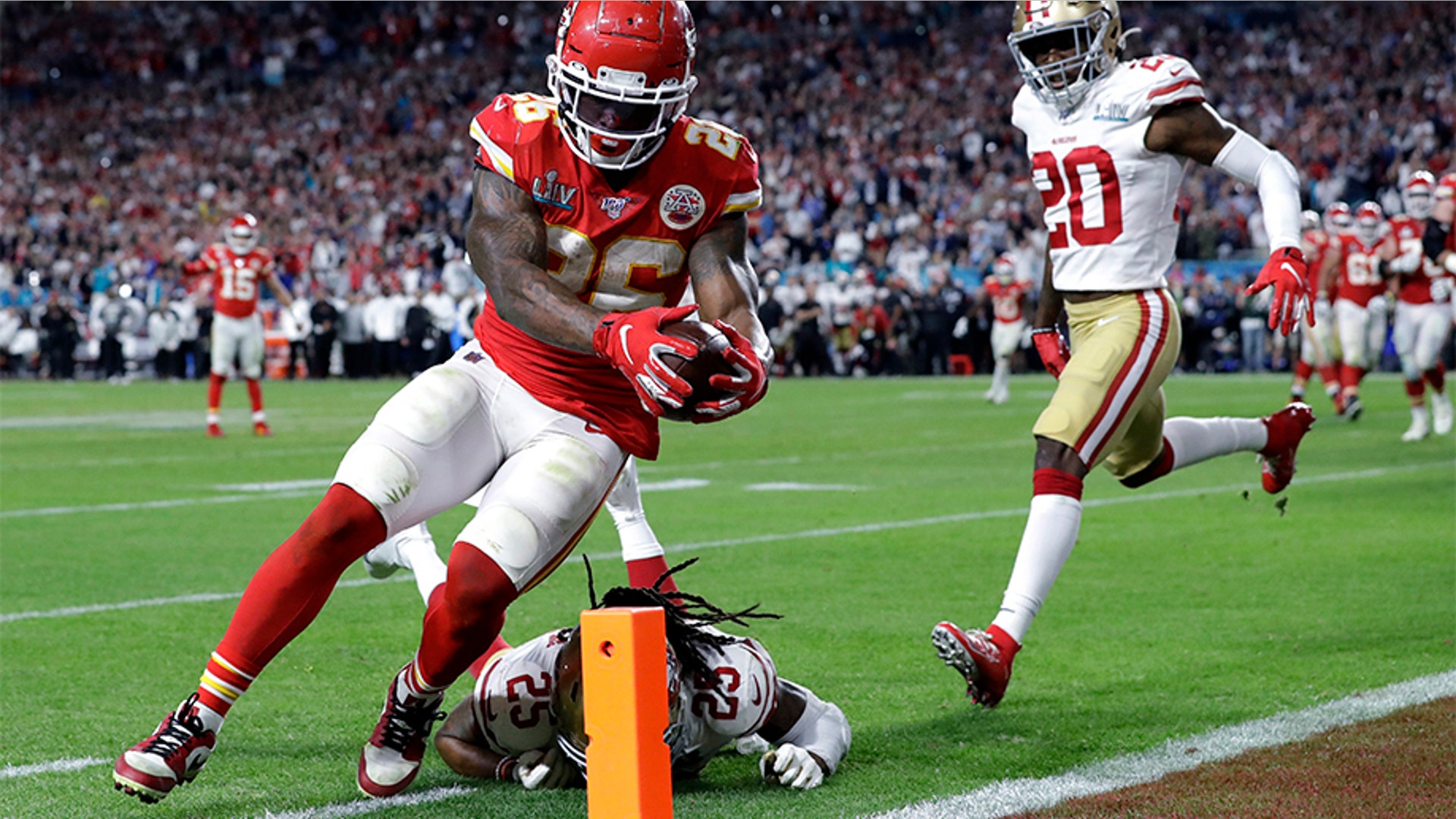 Kansas City Chiefs' Damien Williams (26) scores a touchdown against the San Francisco 49ers during the second half.
