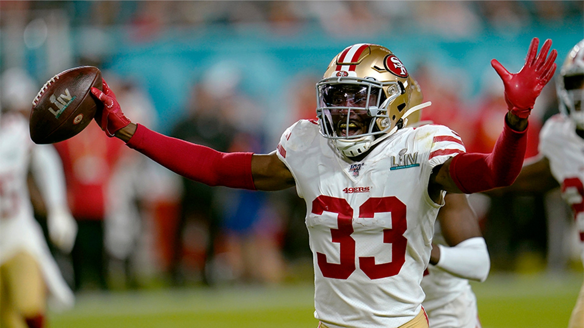 San Francisco 49ers' Tarvarius Moore celebrates his interception against the Kansas City Chiefs during the second half.