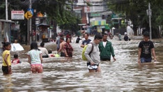 Thousands caught in floods in Indonesia's sinking capital