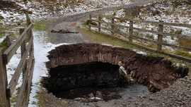 Storms cause massive hole to open up in bridge at national park in the UK