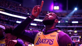 LeBron James pays tribute to Kobe Bryant as Lakers return home: 'Live on, brother'