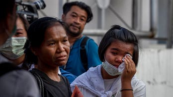 Thailand shooting spree victims' families in anguish, awaiting bodies after 29 killed