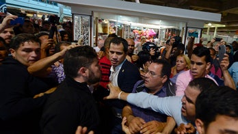 Venezuela's Guaidó faces protests at Caracas airport, calls for new efforts against Maduro with Trump's support