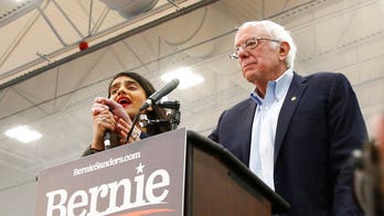 Bernie Sanders interrupted by topless protesters at Nevada rally