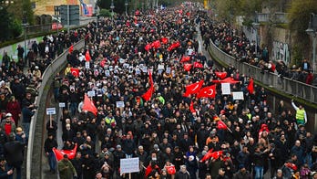 Thousands mourn victims of Germany shooting massacre with massive march