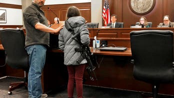 Idaho girl, 11, brings AR-15 rifle to gun legislation hearing