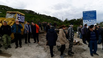 Greek islands see more protests against new migrant detention centers, officers injured in violence