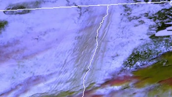 Blizzard conditions in Midwest captured on satellite, storm to usher in 'dangerously low wind chills'