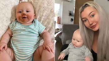 Mom forgets she's covered in fake tan while feeding her baby