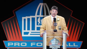 NFL greats cheer as Trump pardons former San Francisco 49ers owner Eddie DeBartolo Jr.