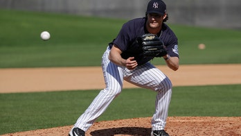 Yanks' Cole strikes out 2 in hitless inning of spring debut