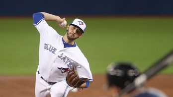 Ex-MLB pitcher sues Astros, claims cheating scandal altered career path: report