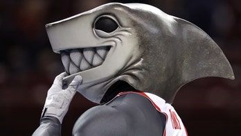 Ole Miss fan, 84, sinks long putt to win new car during basketball game