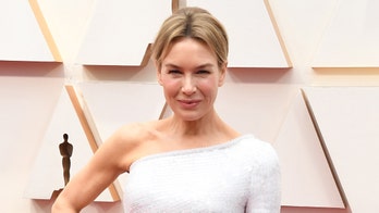 Renée Zellweger stuns at Oscars in one-shoulder dress
