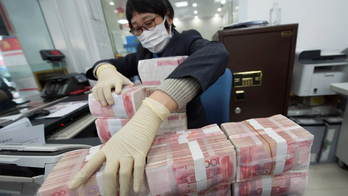 Coronavirus triggers China to destroy, quarantine cash in outbreak hotspots, reports say
