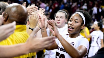 Harris, No. 1 South Carolina earn first win over UConn 70-52