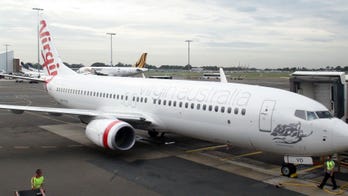 Virgin Australia passenger says dog was left sitting in 93-degree weather while luggage loaded