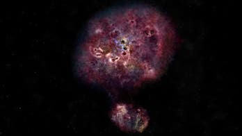 Ancient galaxy grew gigantic, then stopped making stars