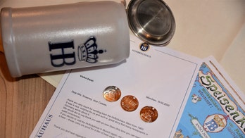 Woman returns beer stein to German beer hall 55 years after stealing it