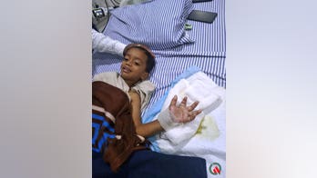 Doctor reattaches boy’s hand severed during horror lawnmower incident