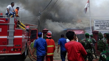 Overcrowded Indonesian prison set on fire after riot breaks out