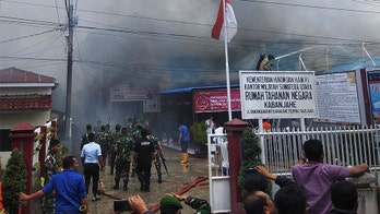Overcrowded Indonesian prison set on fire after riot breaks out
