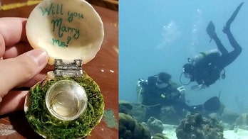 Man shocks girlfriend with underwater proposal in Caribbean Sea