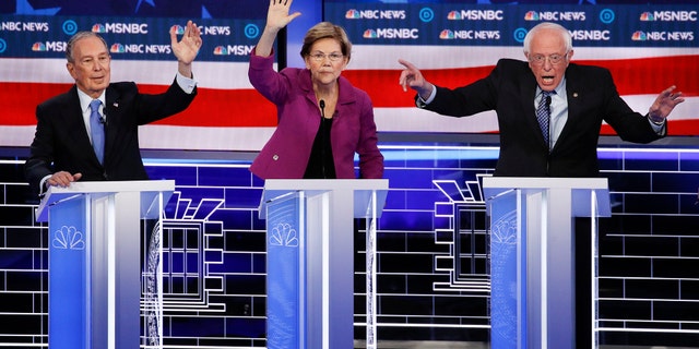 Former New York City Mayor Mike Bloomberg, Sen. Elizabeth Warren, D-Mass., and Sen. Bernie Sanders, I-Vt., during last week's Nevada debate. (AP Photo/John Locher)