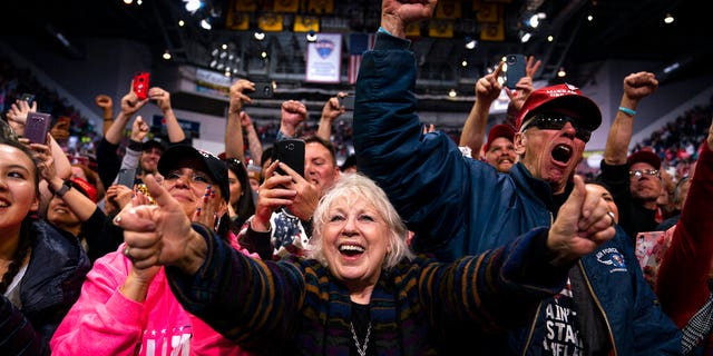 Supporters of President Trump cheering as he arrived to speak at the rally. (AP Photo/Evan Vucci)