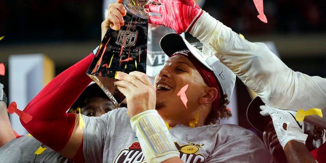 Kansas City Chiefs' Patrick Mahomes hoists the trophy after defeating the San Francisco 49ers in the NFL Super Bowl 54 football game Sunday, Feb. 2, 2020, in Miami Gardens, Fla. (AP Photo/David J. Phillip)