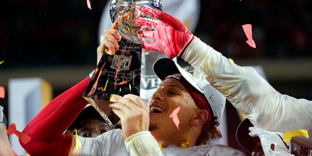 Kansas City Chiefs' Patrick Mahomes hoists the trophy after defeating the San Francisco 49ers in the NFL Super Bowl 54 football game Sunday, Feb. 2, 2020, in Miami Gardens, Fla. (AP Photo/David J. Phillip)