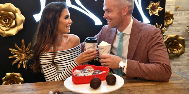 'Million Dollar Listing: New York' stars, Ryan Serhant and Emilia Bechrakis Serhant, shop for Valentine's Day gifts at the GODIVA café located in NYCs Flatiron district on February 10, 2020 in New York City.