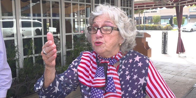 Eighty-five-year-old Maria Falcon says she came to Miami 40 years ago. Wearing a red, white and blue star spangled U.S.A themed outfit, she held nothing back, speaking in both English and Spanish.