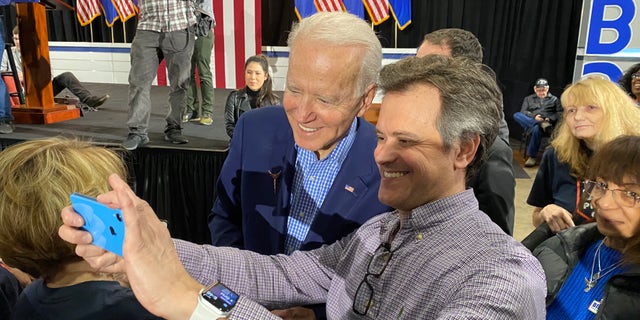 Former Vice President Joe Biden takes selfies with supporters at a post-Nevada caucus celebration, in North Las Vegas, Nevada on Feb. 22. 2020