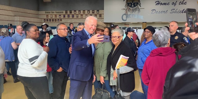 Former Vice President Joe Biden visits a caucus precinct in Henderson, Nevada, on Feb. 22, 2020