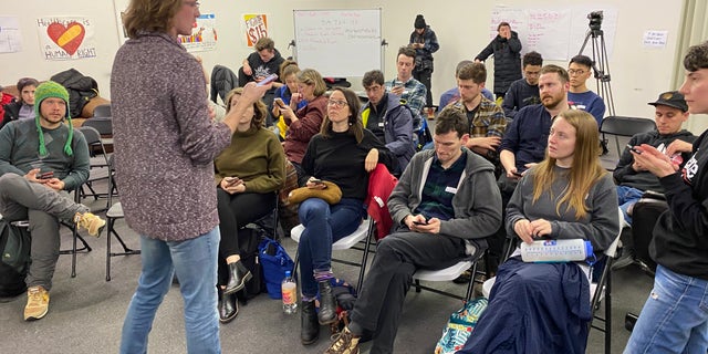 Bernie Sanders volunteers learn how to canvass and phone bank at a training session at a Sanders campaign field office in Des Moines, Iowa on Jan. 31, 2020