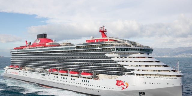 Sir Richard Branson has formally christened the first ocean liner, the Scarlet Lady, pictured, of his new luxury Virgin Voyages cruise company.